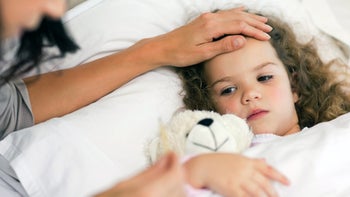 Health: Infections: sick child in bed 828209178