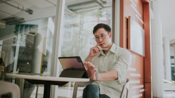 FSA HSA: using tablet outdoor cafe 1370620285