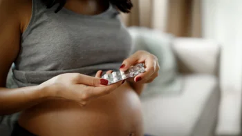 allergies: closeup woman with blister pack of pills 1309623493