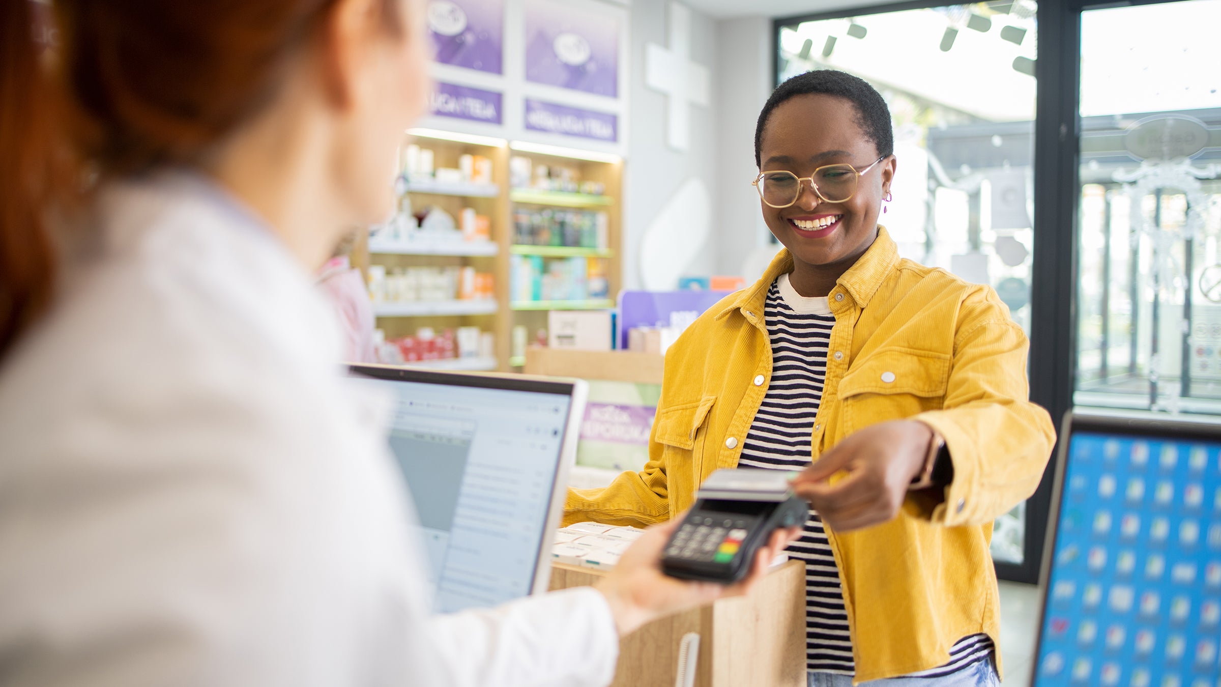 :Drug-Cost-&-Savings: woman shopping at pharmacy 2064277362