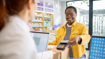 :Drug-Cost-&-Savings: woman shopping at pharmacy 2064277362
