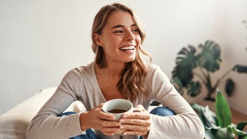 Diet Nutrition: woman enjoying a cup of coffee 2096137422