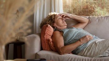 Hypokalemia: Fatigue: senior woman laying on a couch 1476743850