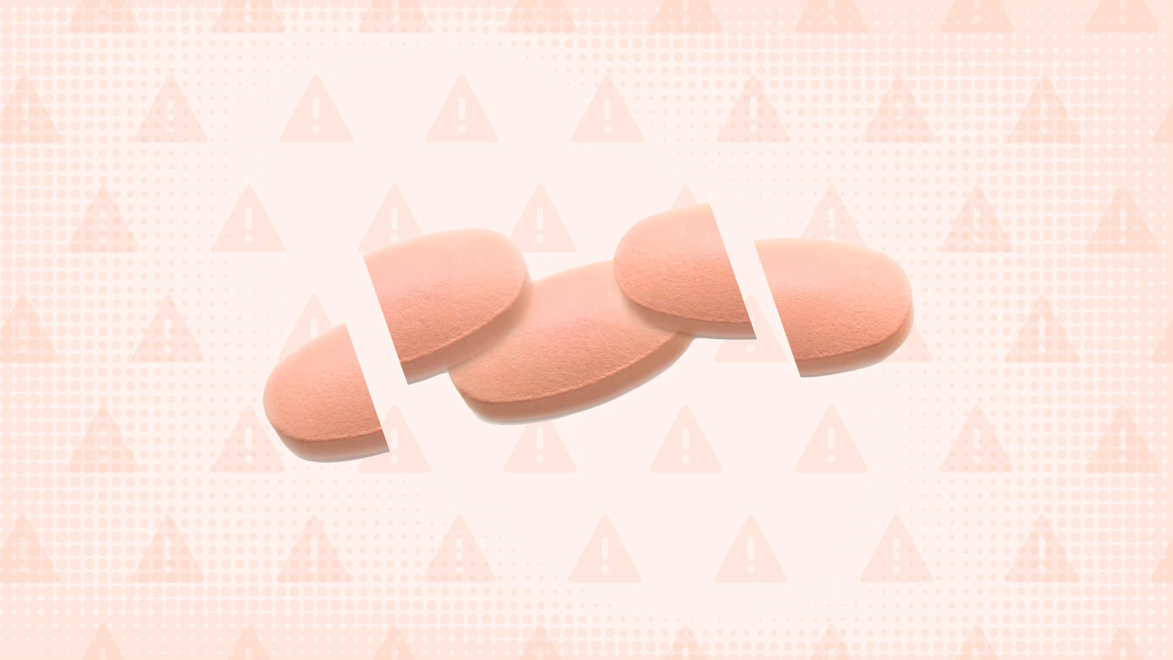 Three pink pills are shown on a light peach colored background with texture and warning sign pattern. The first and last pills are cut in half; the middle pill is whole.
