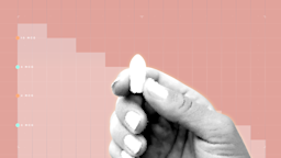 In the center of a peach background with graph paper texture and representational step graph is a black and white cutout of a hand holding a vaginal suppository pill.
GoodRx Health