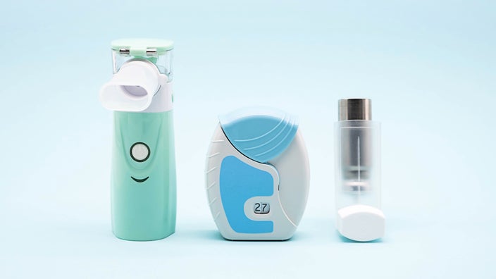 3 different inhalers on a baby blue background.