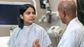fertility: woman at medical appointment 1173367779