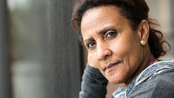 portrait of a woman serious expression-470980459