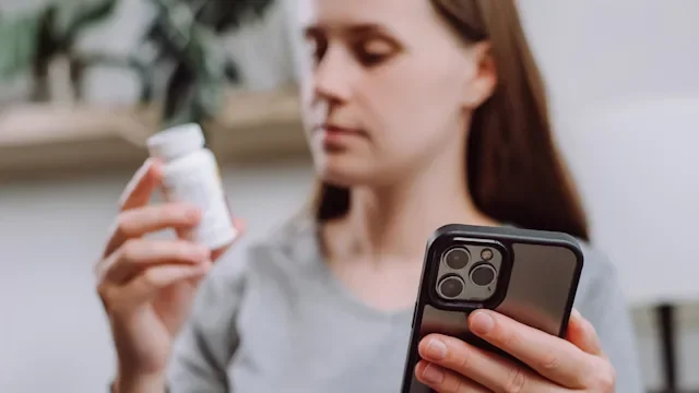 Medication Education: woman looking up medication 1695179843