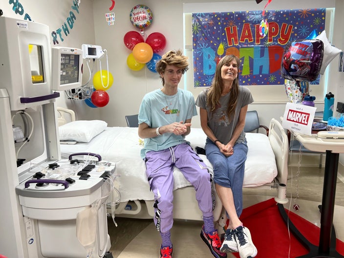 Michael Cramer is pictured in a hospital room with his mother, Ashlee. The room is decorated for his birthday.