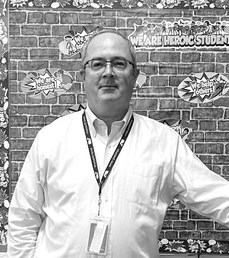 Man standing in front of wall