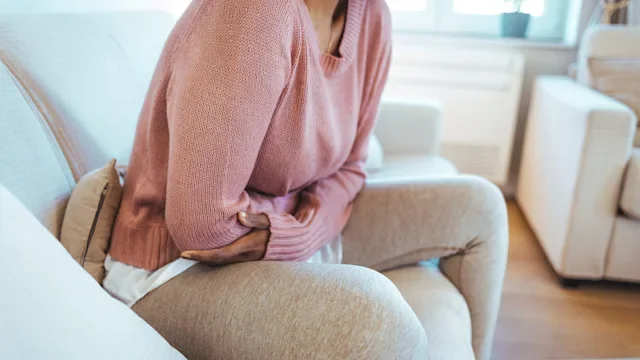Diarrhea: closeup woman with stomach pain 1382291597