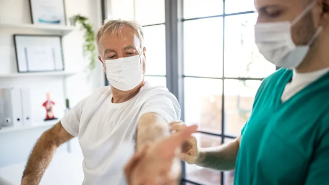 COVID-19: surgical mask patient checkup 1307398474
