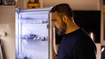 Medication Education: man looking inside of refrigerator 1357735060