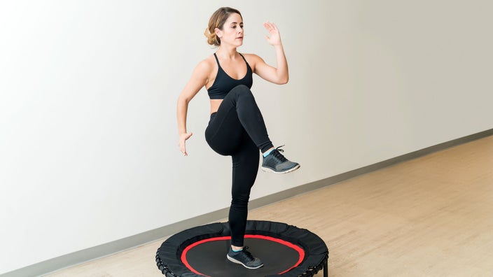 Woman doing trampoline exercise.