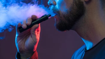 substance-use: man smoking electronic cigarette 1203512459
