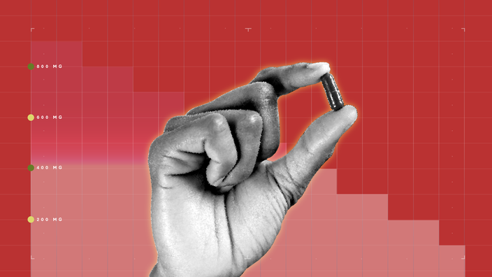 Red background with graph paper texture and a representational step graph. In the center is a black-and-white cutout of a hand holding a single pill. 