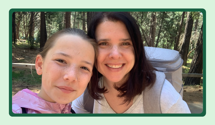 Heather King and her daughter are pictured on a walk in the woods.