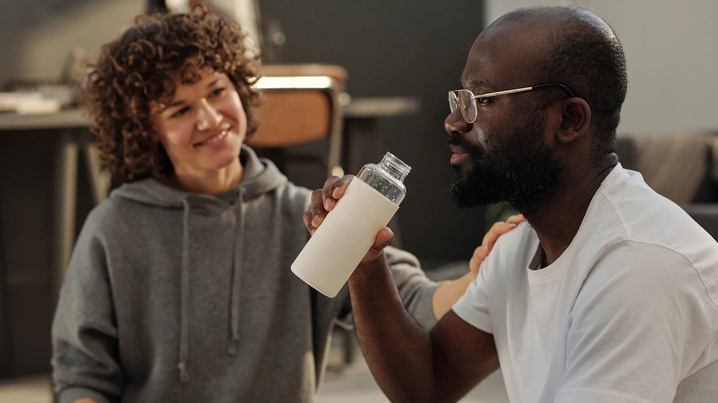 A man with diabetes is drinking from a water bottle. 
shironosov/iStock via Getty Images Plus