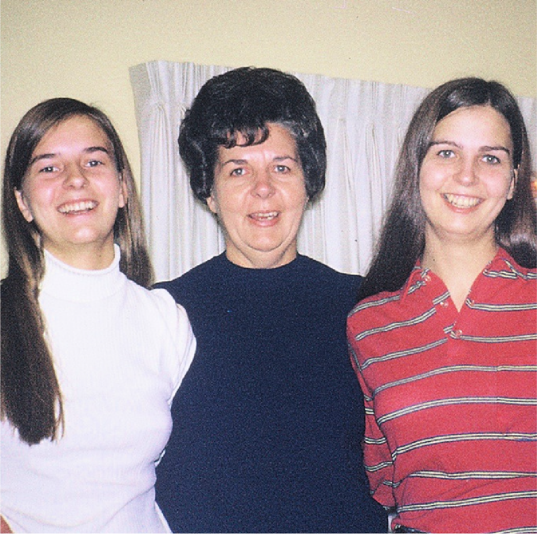 Photo of Sue Macdonald (left), with her mom and sisters