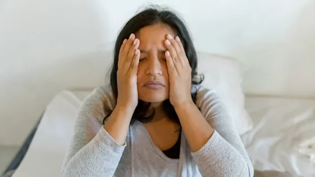 Sudafed PE: Side effects: holding face headache in bed 1225488826