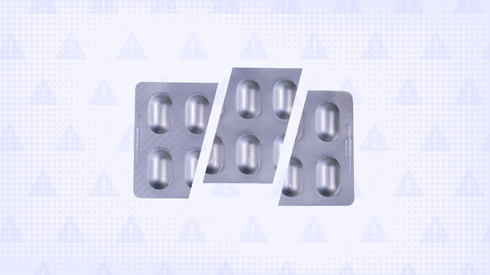 Light-purple background with texture and warning sign pattern. In the center is a blister pack of pills, cut into thirds. 