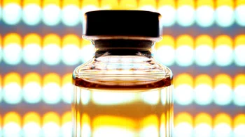 Peptides: vial in front of yellow lights 2279714190