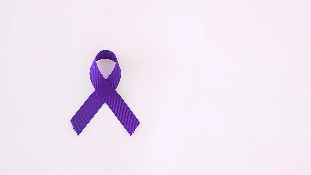 Purple cause ribbon on a light background.