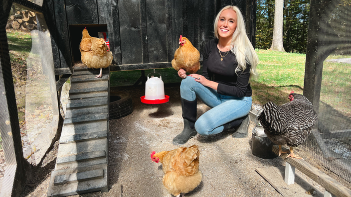 Spinella is pictured with her backyard chickens.
