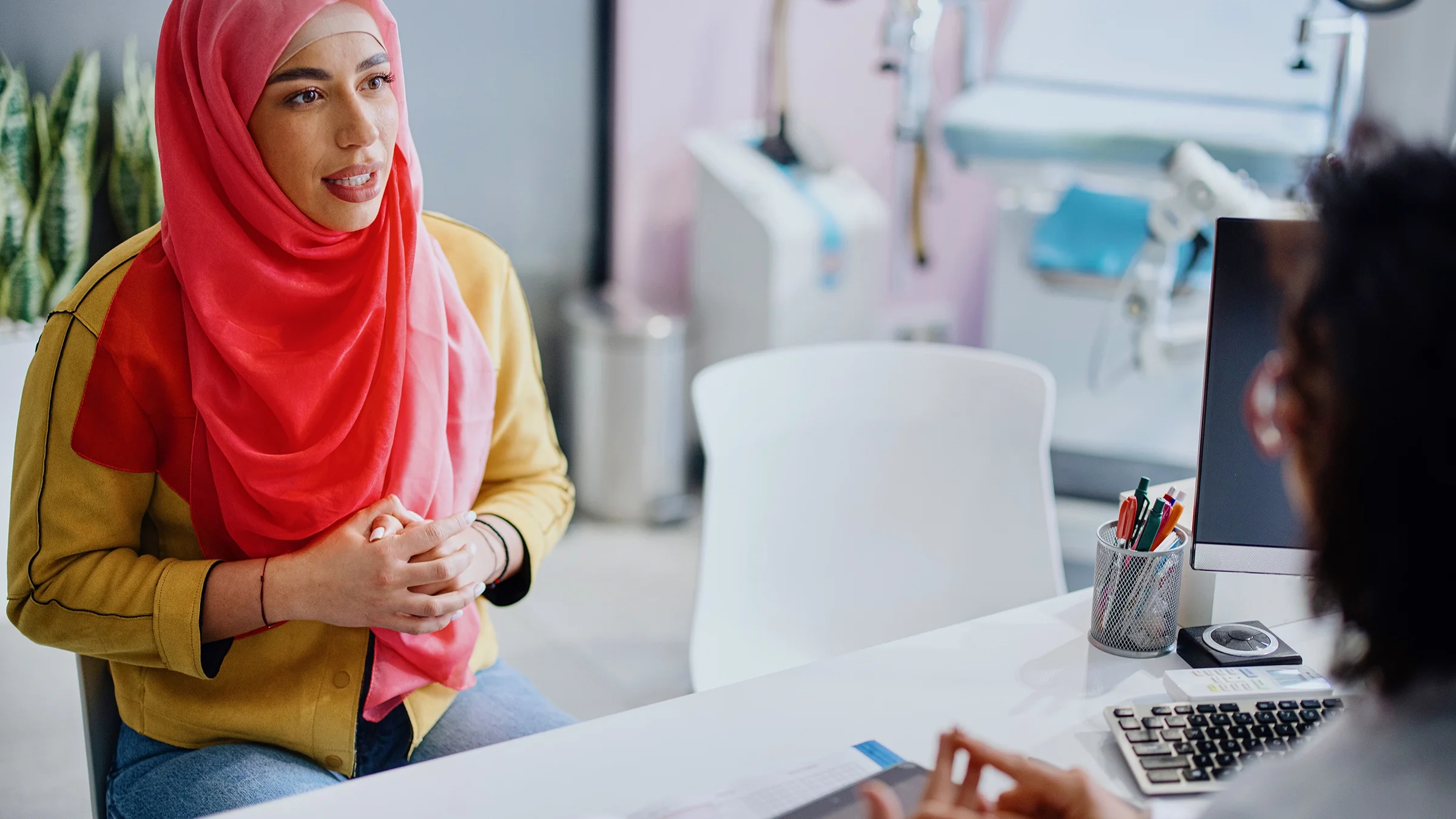 A patient reviews the results of medical tests with her doctor.