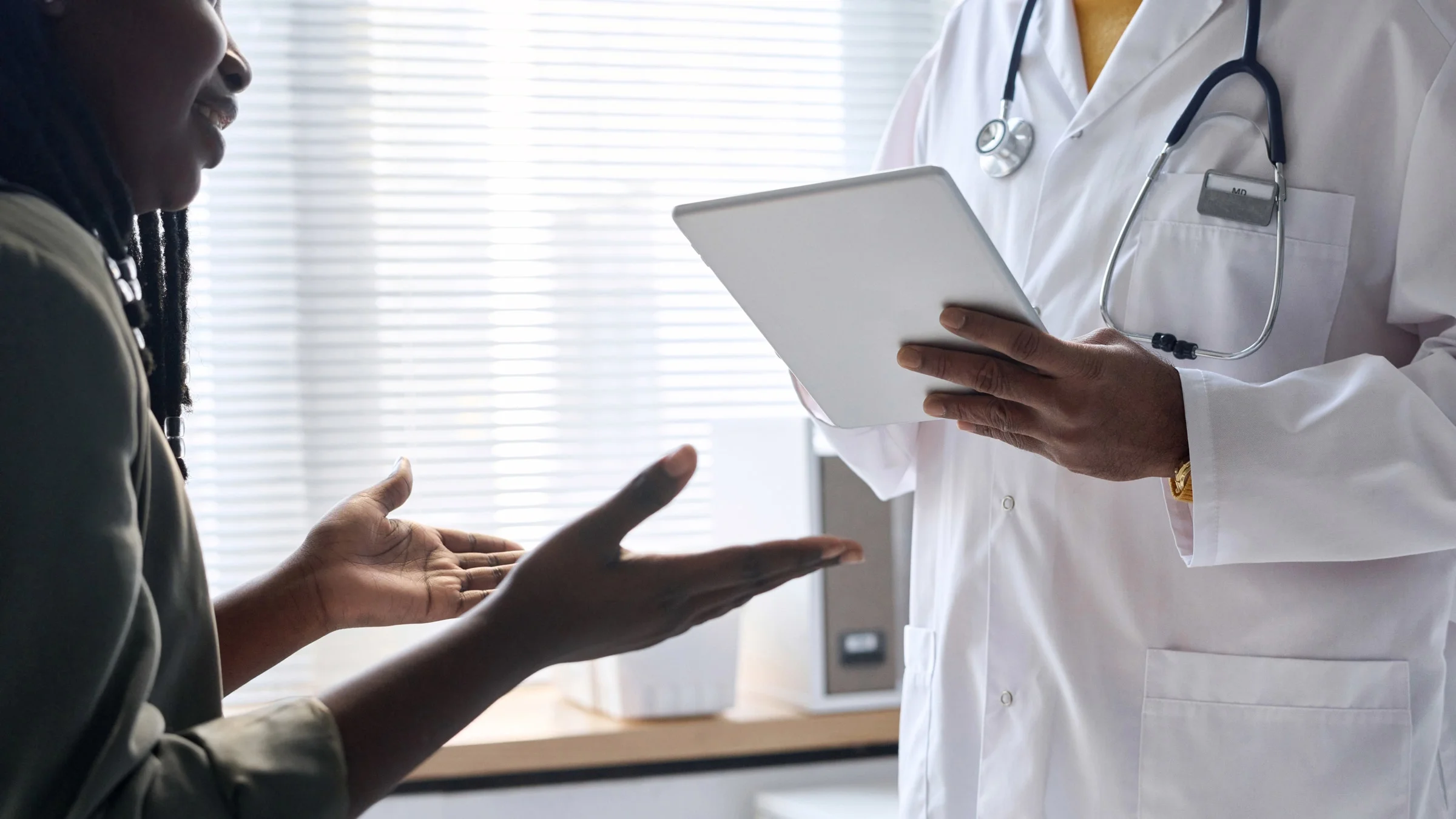 A patient and doctor talking.
