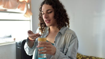 HIV: PreP drugs and GAHT: transgender girl taking pill-1346235791