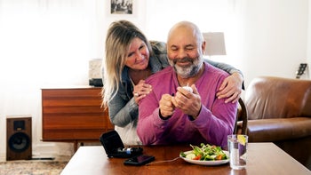 Medication Education: man checking blood sugar at home 1372593406