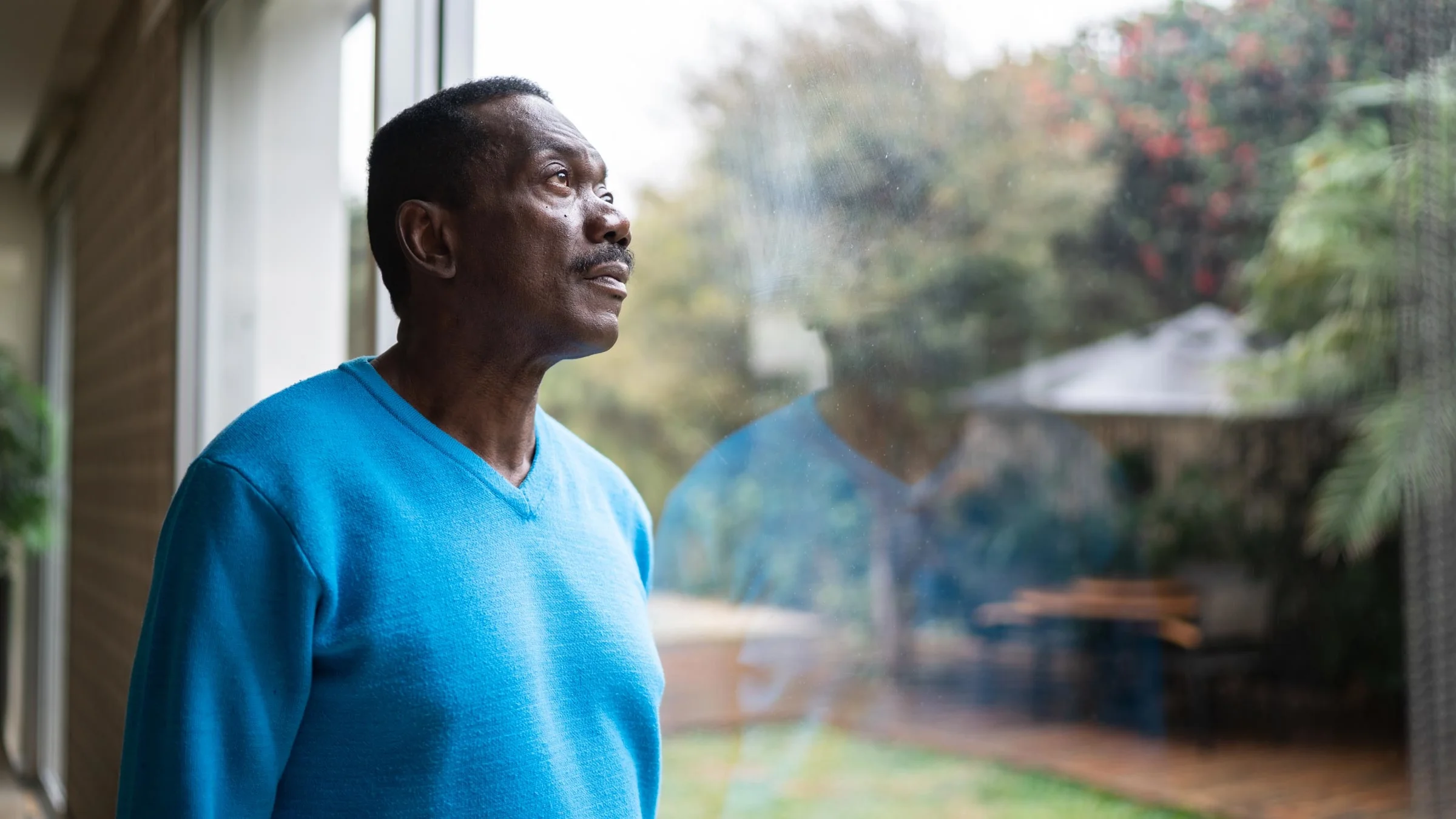 A man looks out the window. Older adults who experience confusion may have delirium or dementia. It’s also possible to have both conditions at the same time. Learning to tell the difference is key to treatment. 