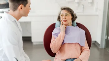 Alendronate: patient at the dentist 2160991528