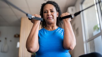 senior health: woman doing pilates 1348460870
