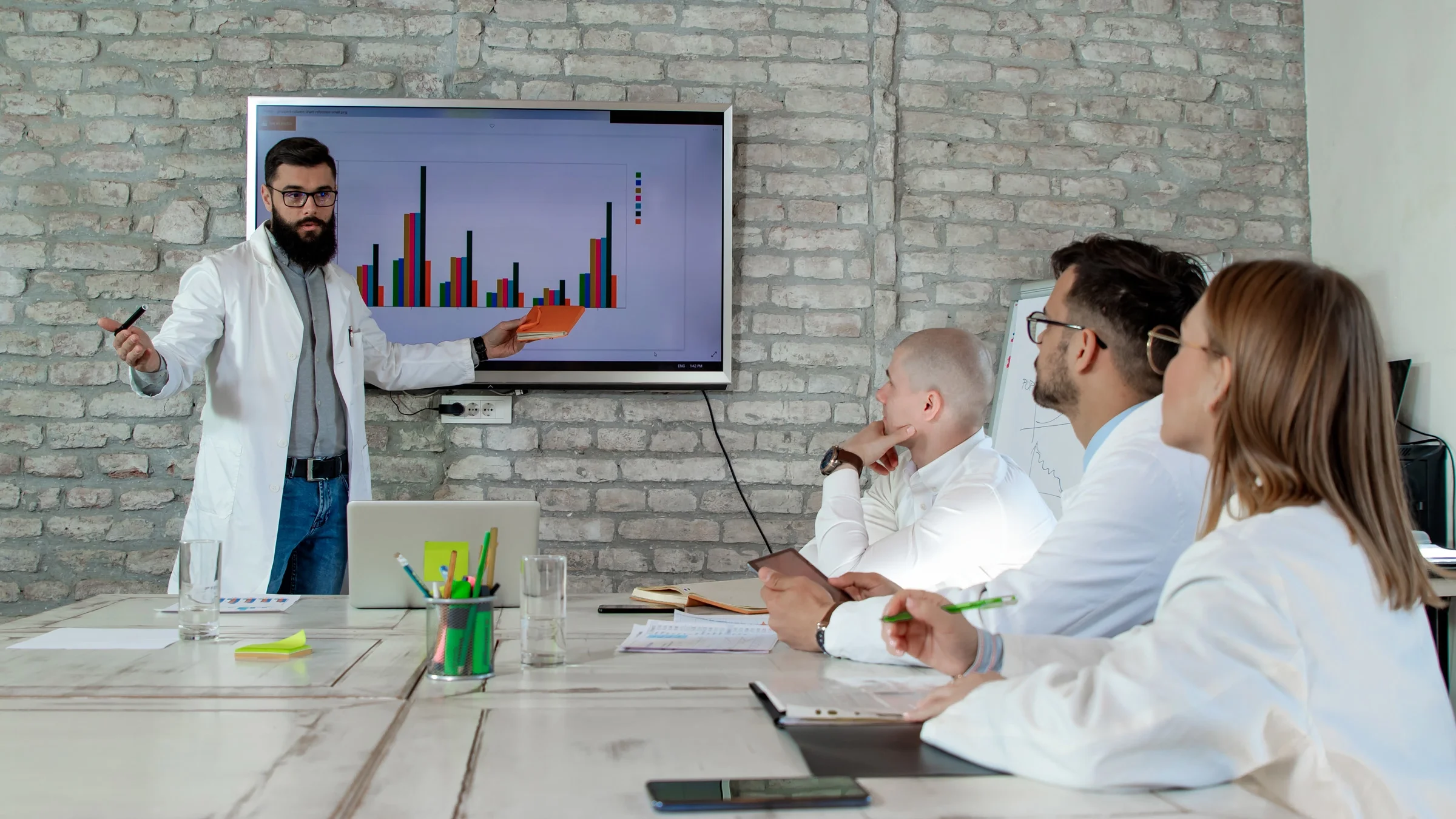 Pharmacists in a marketing presentation. 