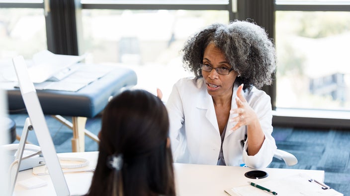 Woman consults with doctor