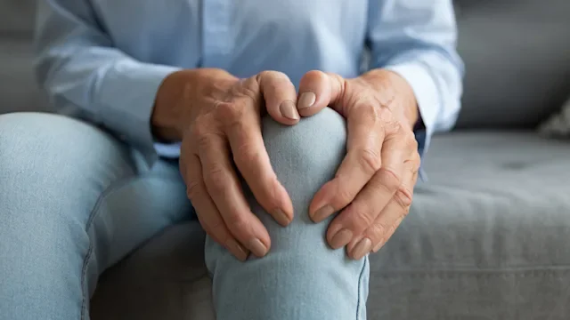 Joints: Bursitis: closeup knee pain 1267013569
