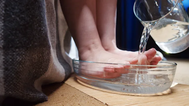dermatology: closeup foot soaking in water 1335215842
