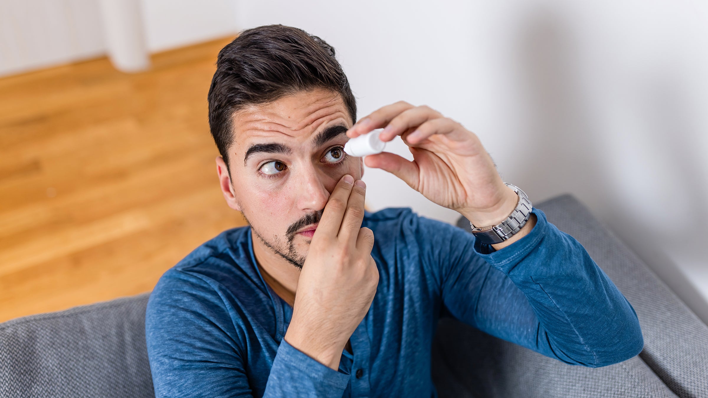 Presbyopia: man applying eye drops 1431478168