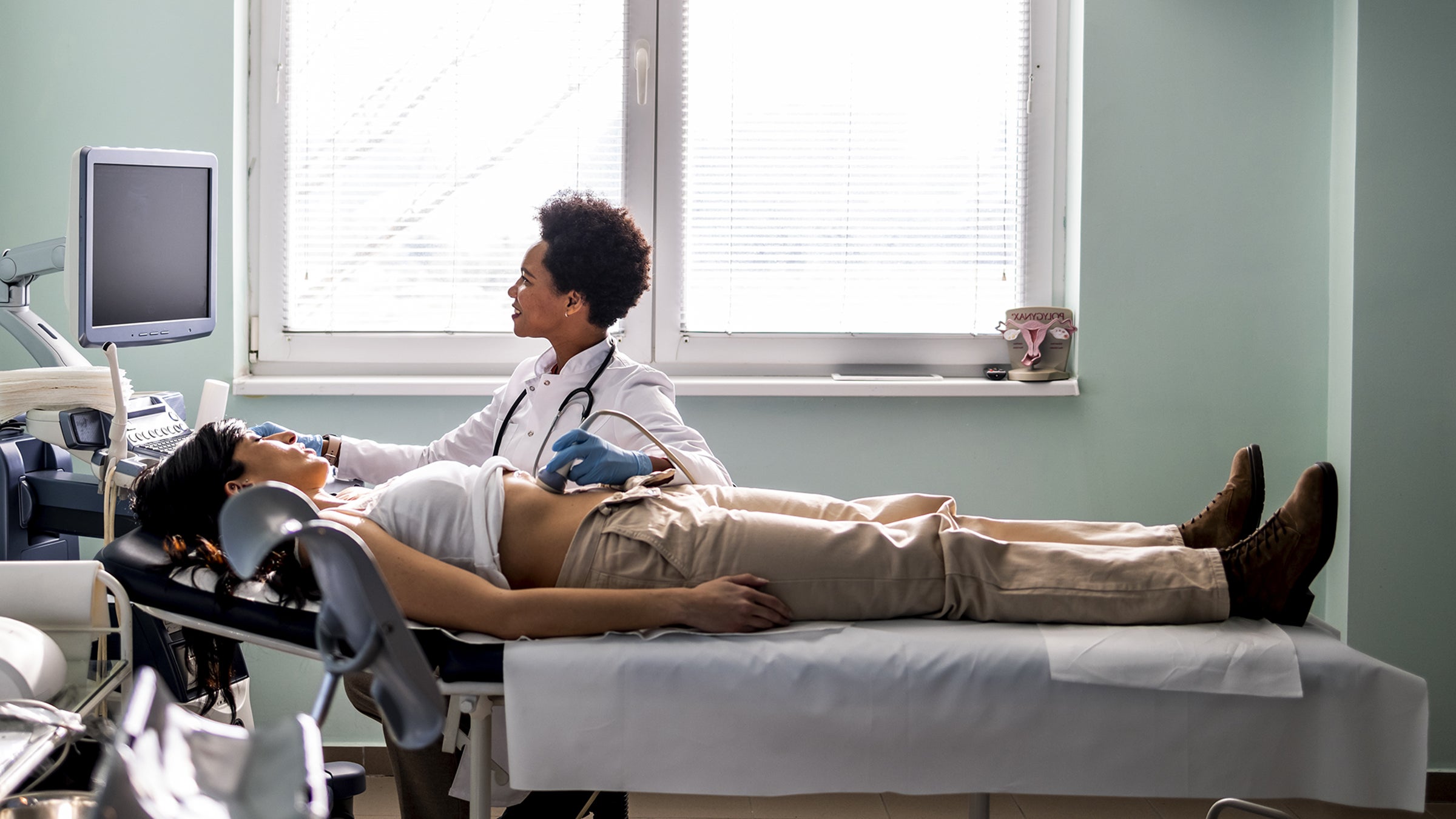 Hepatitis B: woman stomach ultrasound 1467241342