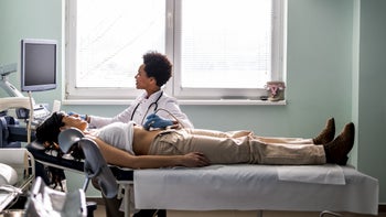 Hepatitis B: woman stomach ultrasound 1467241342