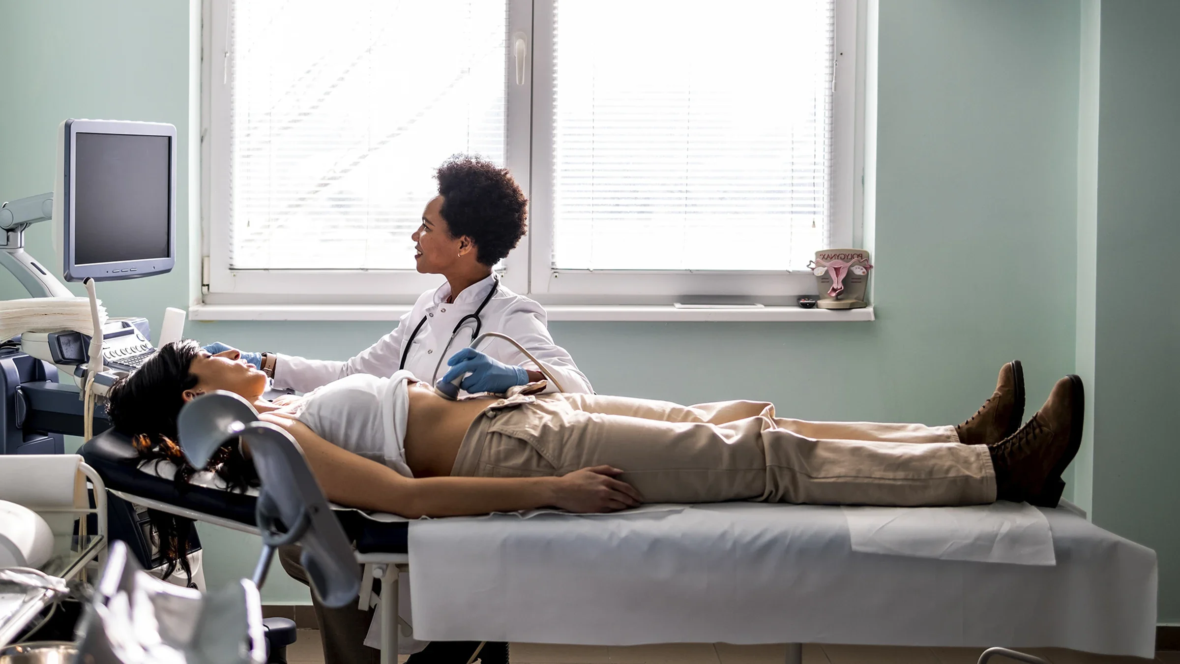 Hepatitis B: woman stomach ultrasound 1467241342