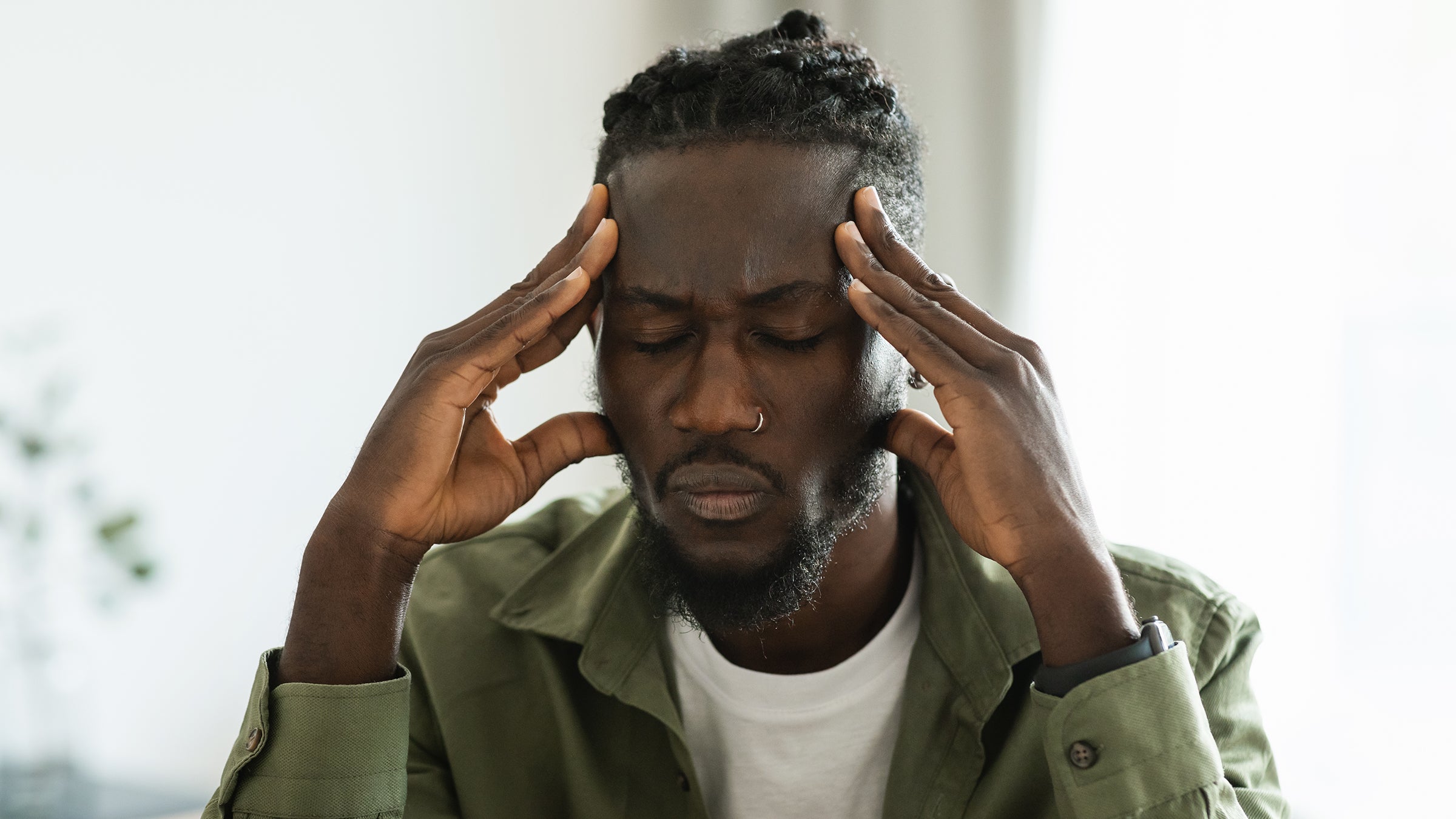 Health: Migraine: man with headache 1473924209