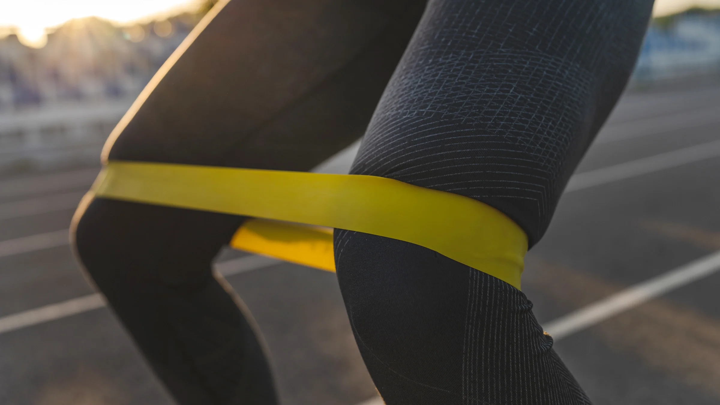 Close-up of a leg workout with a resistance band