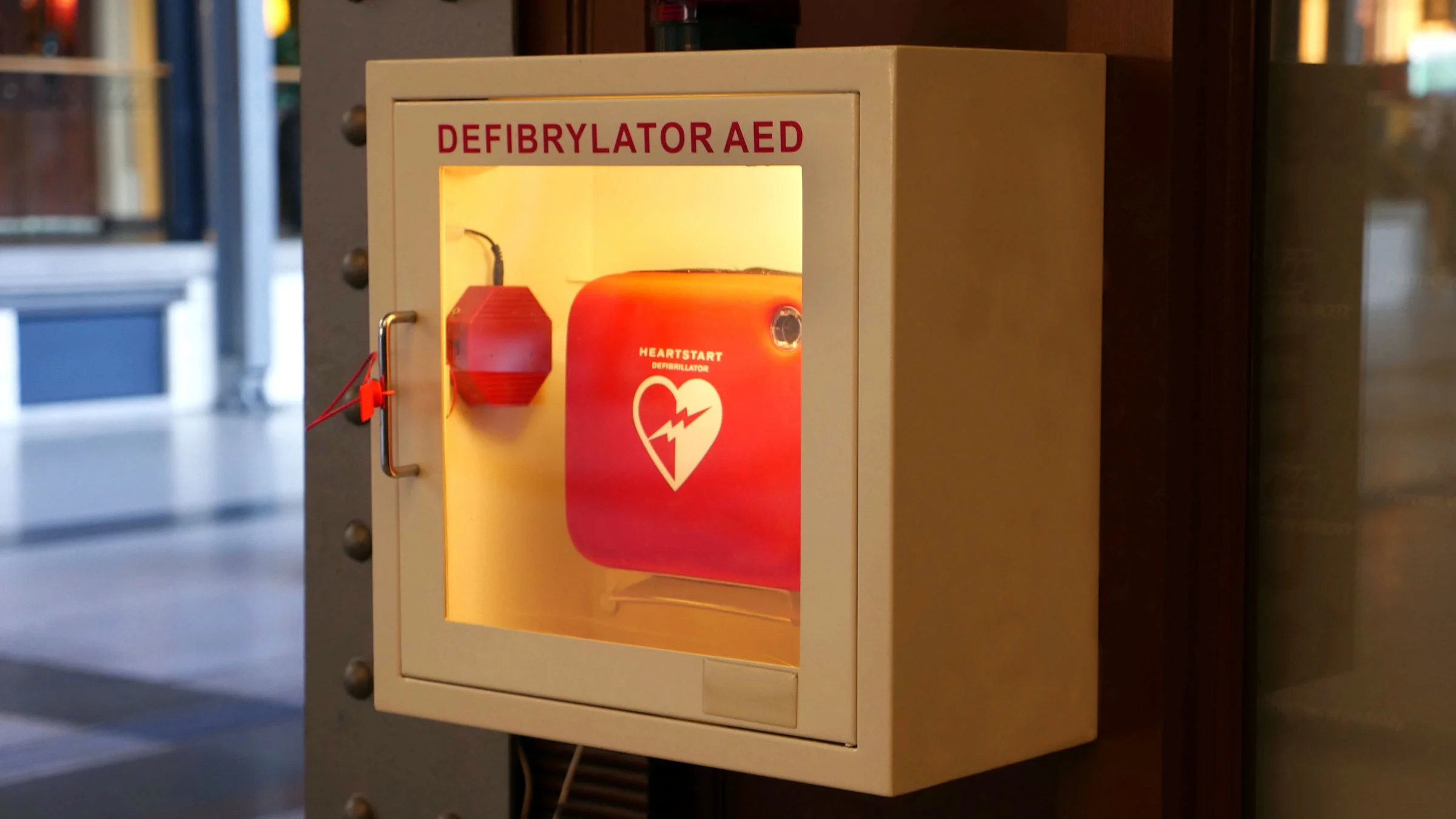 A close-up of an automated external defibrillator (AED) 