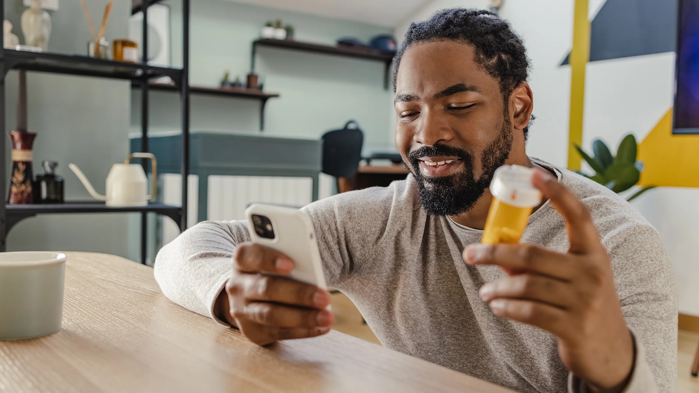 Man searching for information about medicine with smartphone. 
