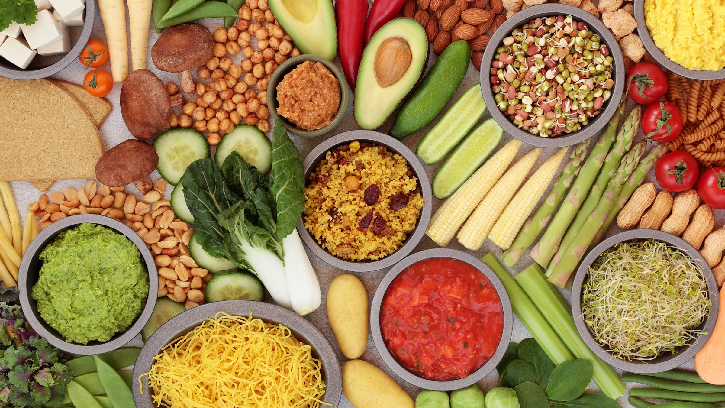 Health: Diet Nutrition: flat lay healthy vegan foods-1296702891