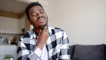 Health: Flu: man sore throat 1386885344